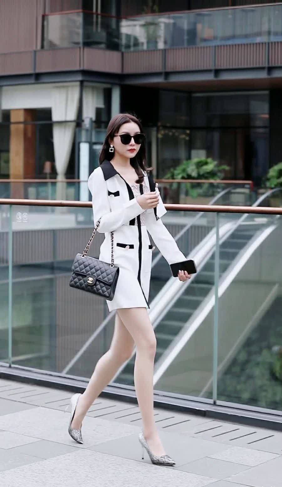 职业装 高冷小姐姐穿职业装戴黑墨镜 舒适休闲 尽显曼妙身姿