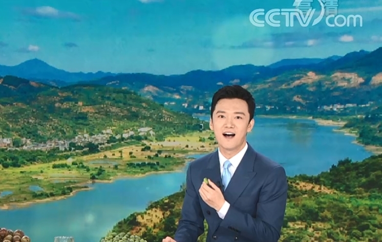 橄欖|張韜:《新聞直播間》秀才藝,喜提第一個在主播臺上清唱的男主播