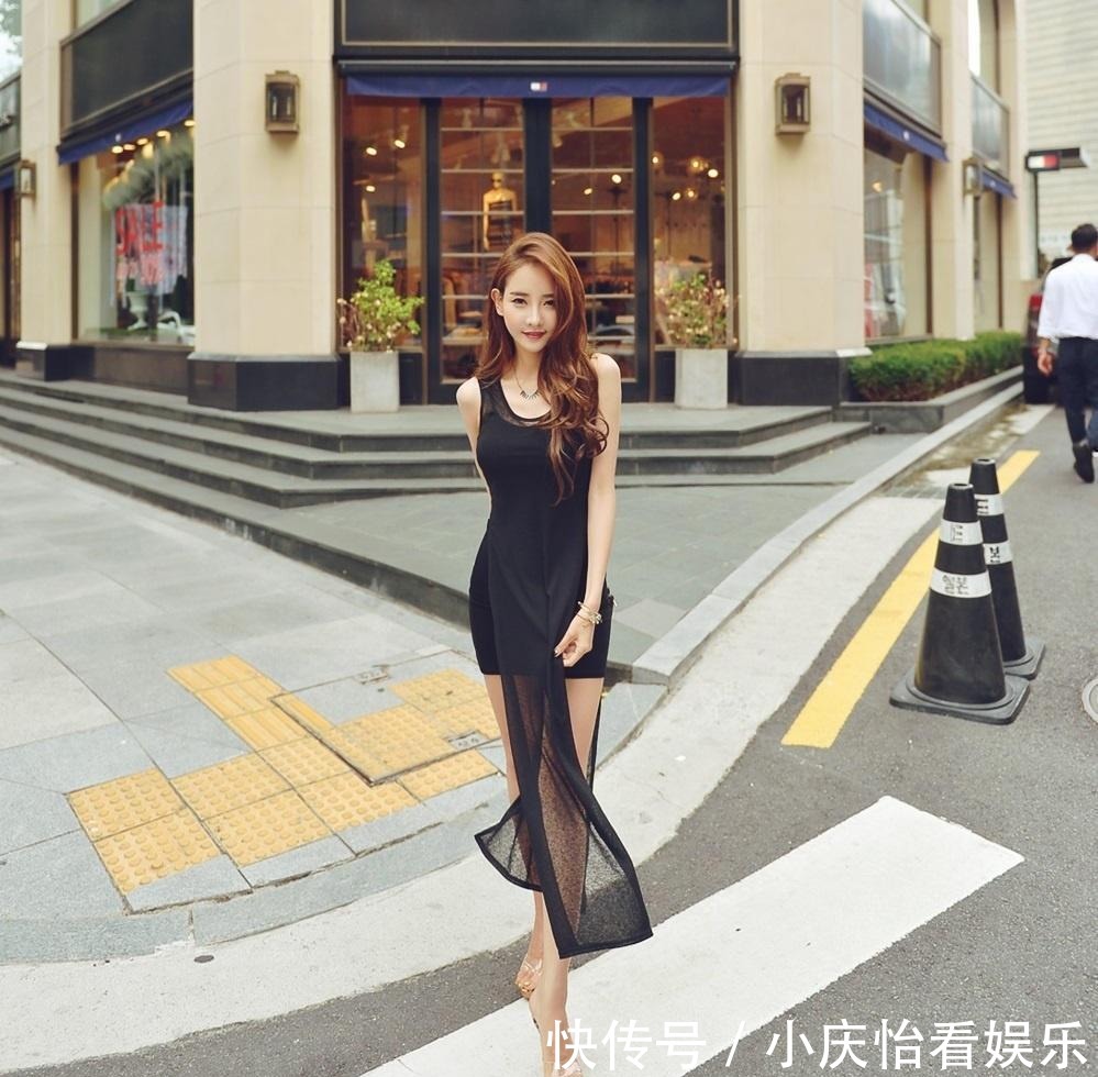高级感|靓丽美女身穿黑色背心连衣短裙，展示出奢华的高级感