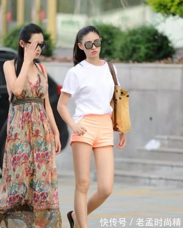 清纯|街拍:清纯性感的美女一副很好的风景只是大叔突然闯进来了