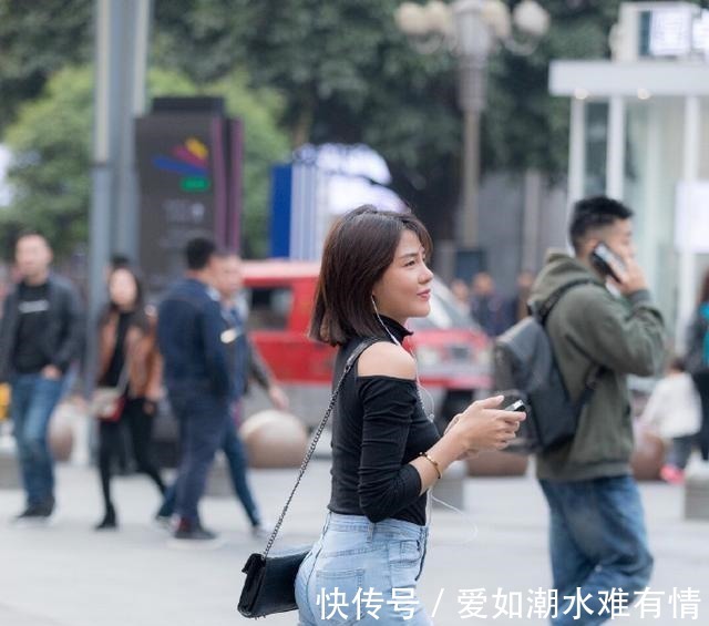 短发 黑色修身上衣搭配高腰牛仔裤，简约时尚，魅力四射！