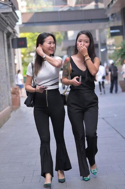 裤子|街拍:不用非得是裙子,女人穿裤子也很有韵味,魅力挡不住