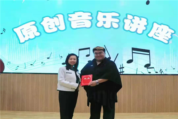 艺术系|音乐人勒荣多吉受聘江西泰豪动漫学院客座讲师