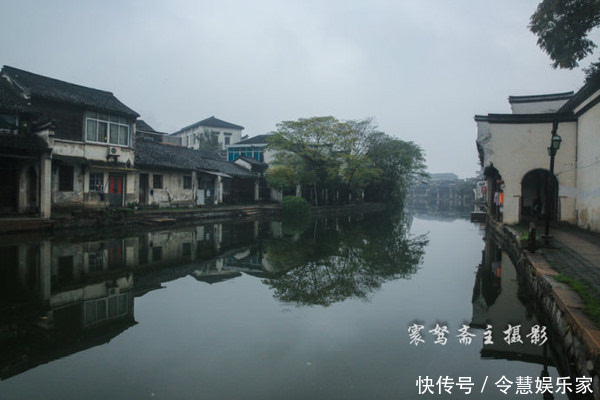 烟雨蒙蒙中走进南浔古镇的“百间楼”，再尝尝当地的风味美食