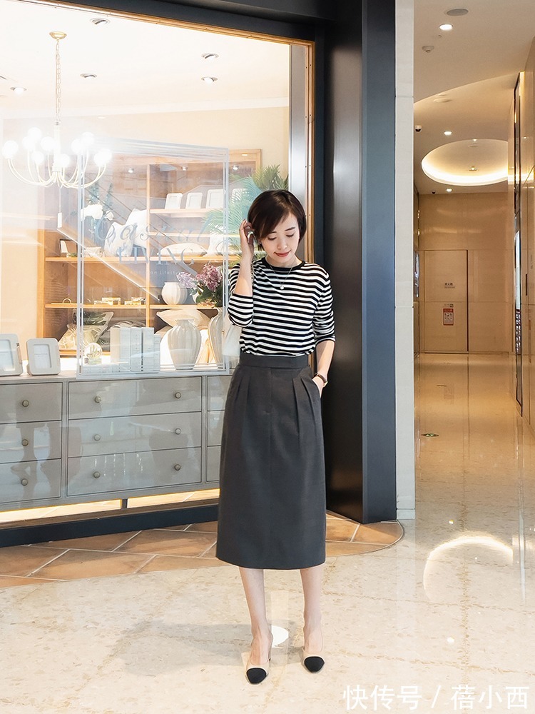 搭配 早春穿裙子流行“过膝不过踝”,配西装、风衣都挺美,打造时髦感