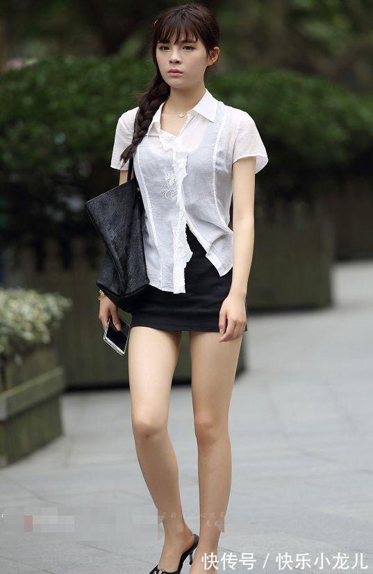 蕾丝 小姐姐戴着墨镜，搭配时尚的牛仔短裤，看上去很优雅