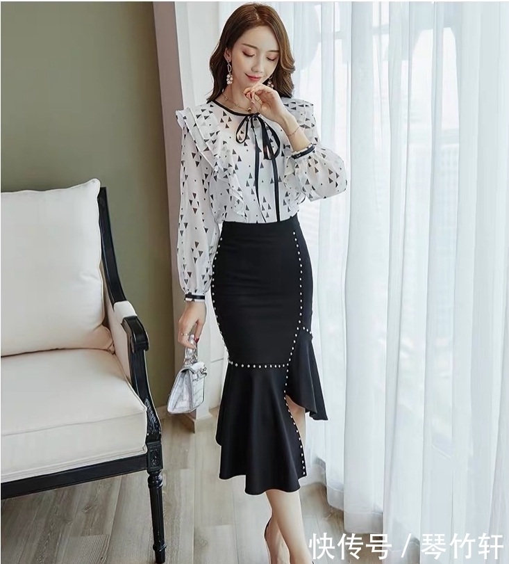 套装裙:清新温柔雪纺衫搭配不规则鱼尾裙,凸显女性曼妙身材