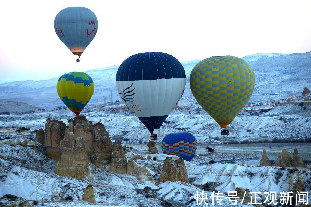 幻景|冬日幻景:土耳其山谷雪后升起缤纷热气球