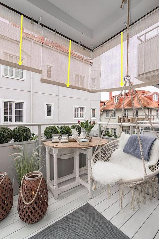 玻璃窗|阳台不能封有对策了，对面住户在楼板上挂5个帘子，防晒遮阳