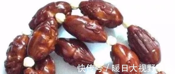 魏学洢!盘了600年的橄榄核包浆啥样?玉化橄榄核雕欣赏