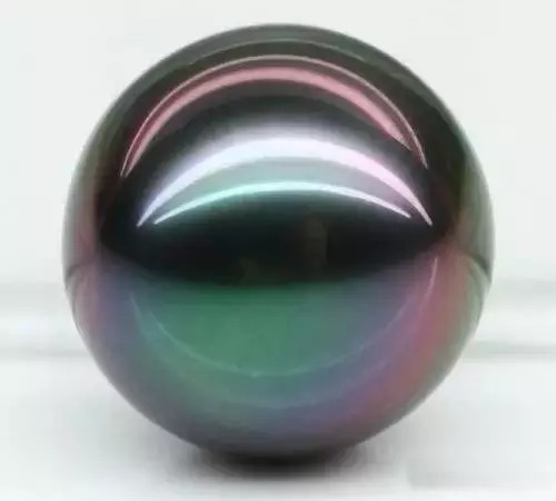 手串有包浆的美，珠宝有猫眼的光