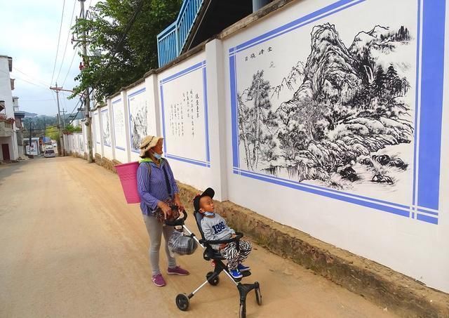 张建军!南华8名画家书法家手绘壁画 助力文明城市创建