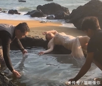 艺术照|奇闻:新娘躺水边纹丝不动,两个男人在旁边扯裙子,成片惊艳