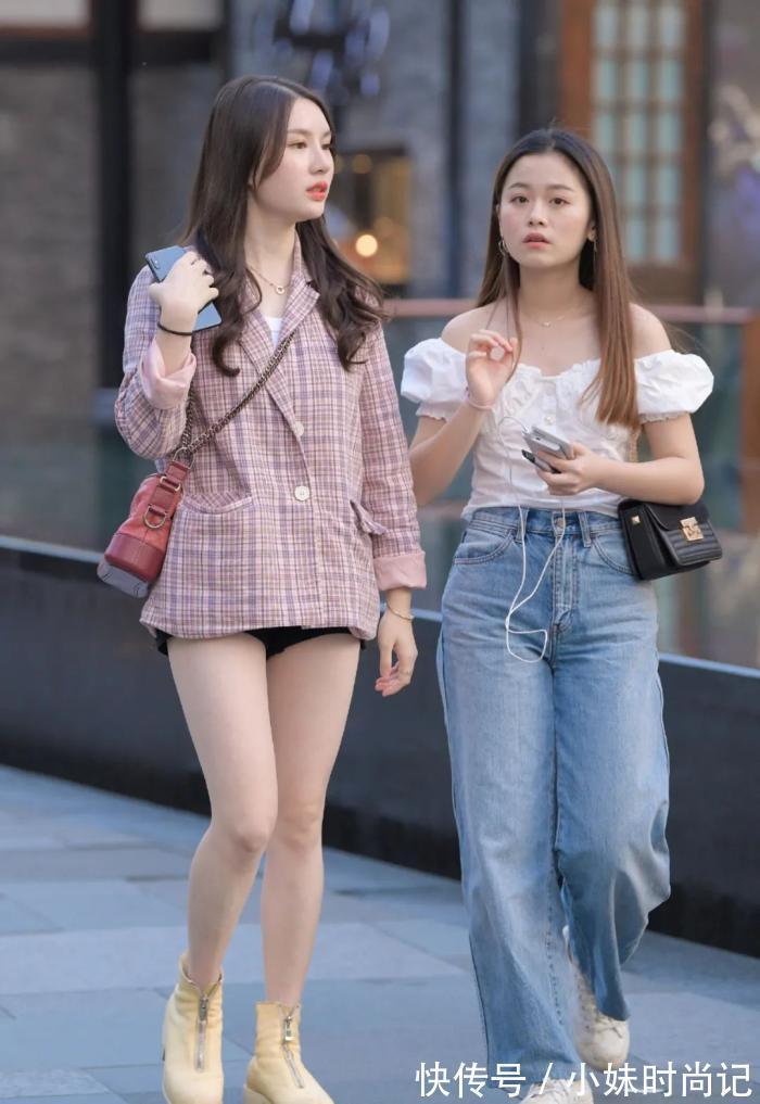 美女 街拍美女:皮肤白皙美丽的颜值美女,粉色西装外套和潮流短裤,清纯美丽