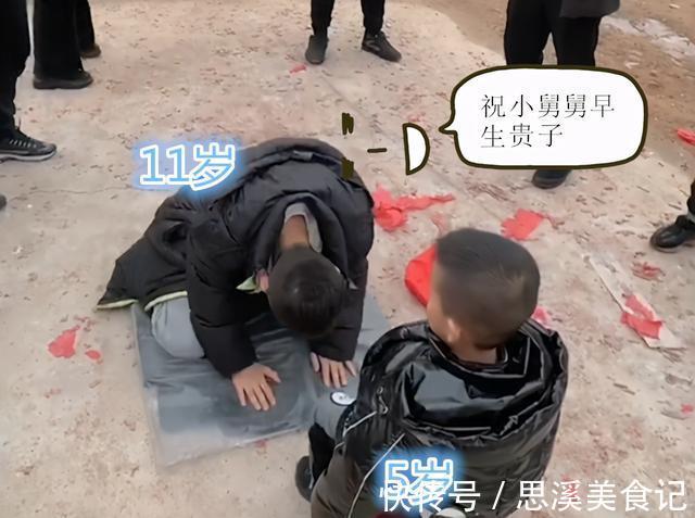 晚辈|辈大压人:3个月大的“舅舅”接受外甥磕头拜年,全程表情淡定