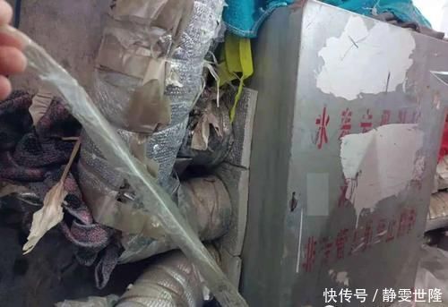 表箱|贴胶带 裹棉垫……老旧居民楼的住户为了让水表安然度过这个冬天真是创意无限