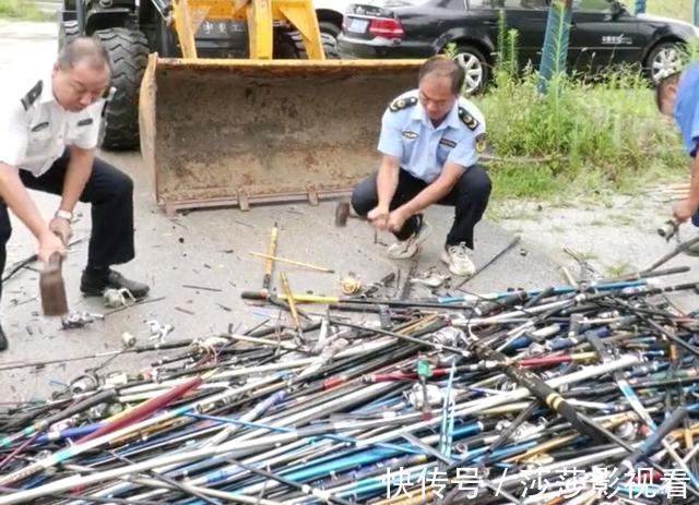 湖北十堰集中销毁违规鱼竿400多支，用推土机压，厂家笑了？