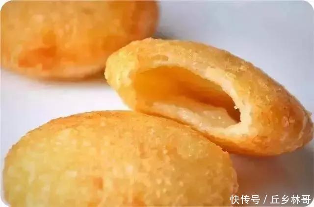 炸糖糕家常做法,简单易学,外皮金黄又酥脆,个个空心不流糖