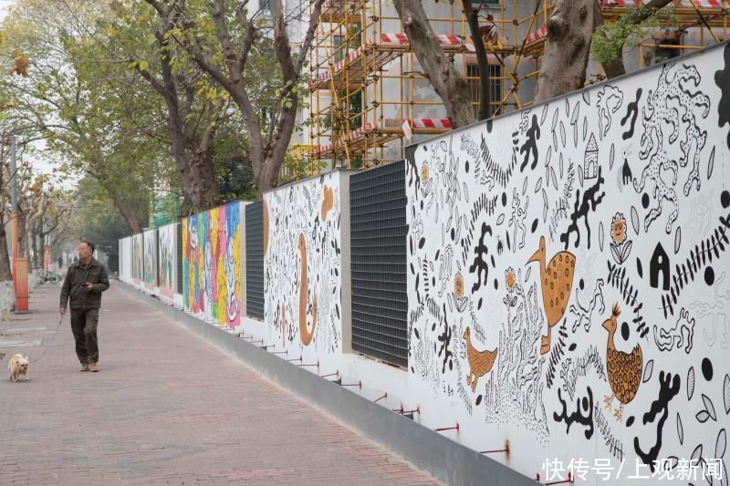 包围|30余幅彩绘绵延600多米,上海徐汇一老小区被涂鸦“包围”……