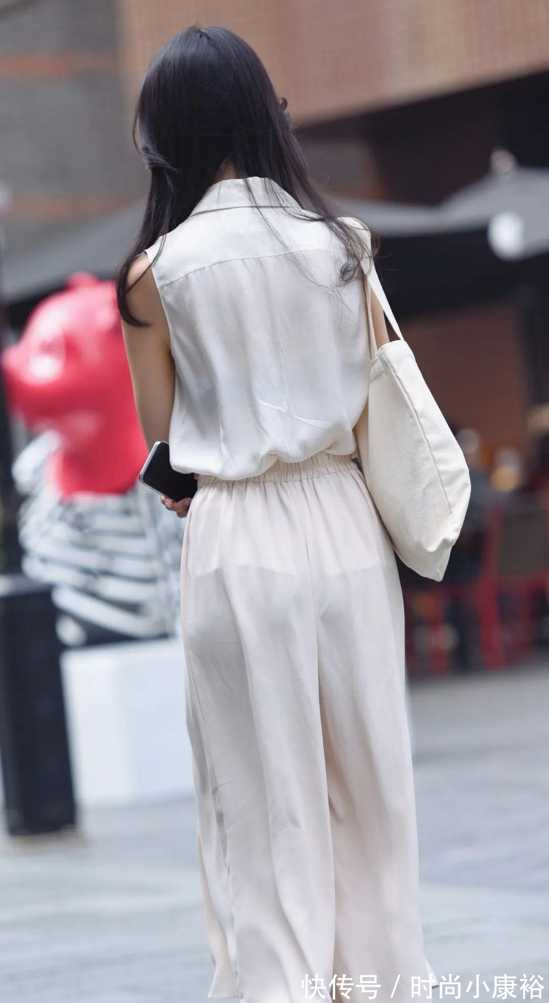 贵妇 气质优雅的贵妇,裙裤尽显她的曲线美