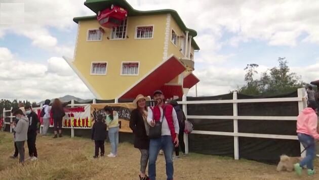 哥伦比亚|哥伦比亚小镇一栋两层高的倒立房屋吸引众多游客参观