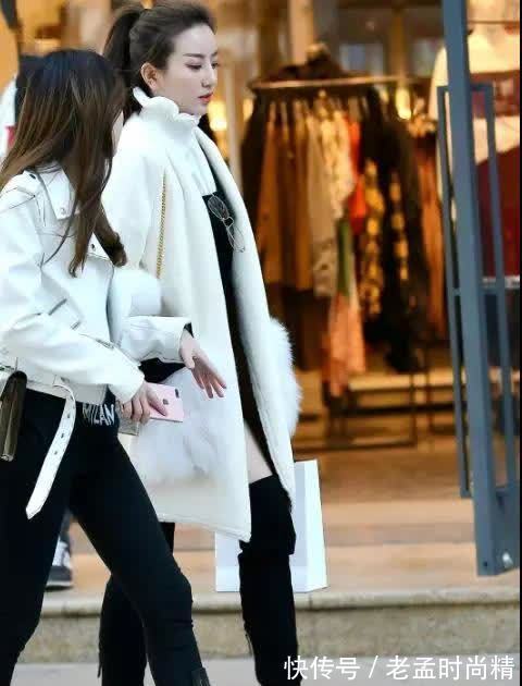 美腿 街拍:动人不凡,穿黑色长筒靴的美腿美女,肉色打底裤很是性感!