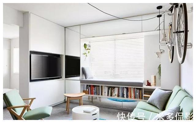 玄关|35㎡小公寓,用自行车做背景墙,躺在书柜上就能晒太阳,好惬意!