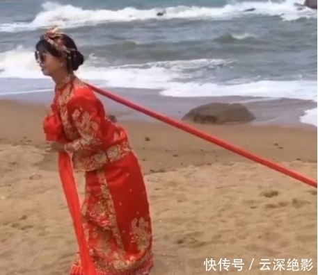 拍照|胖新娘用一根红绳拖着新郎拍照,新郎表情很不爽,成片却让人惊艳