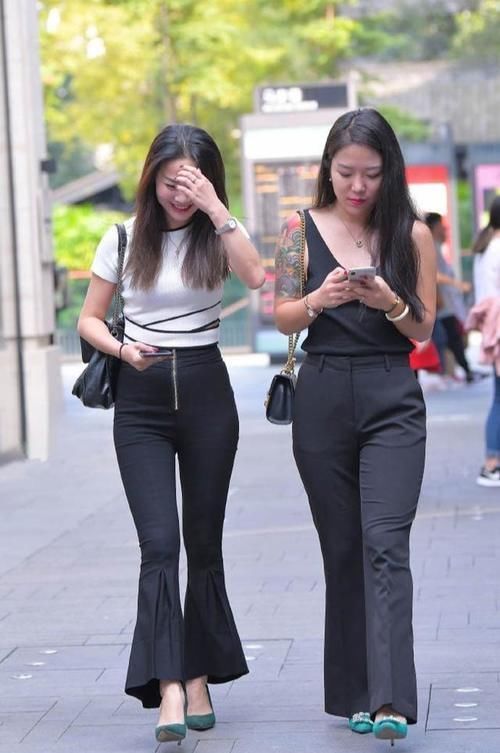 裤子|街拍:不用非得是裙子,女人穿裤子也很有韵味,魅力挡不住