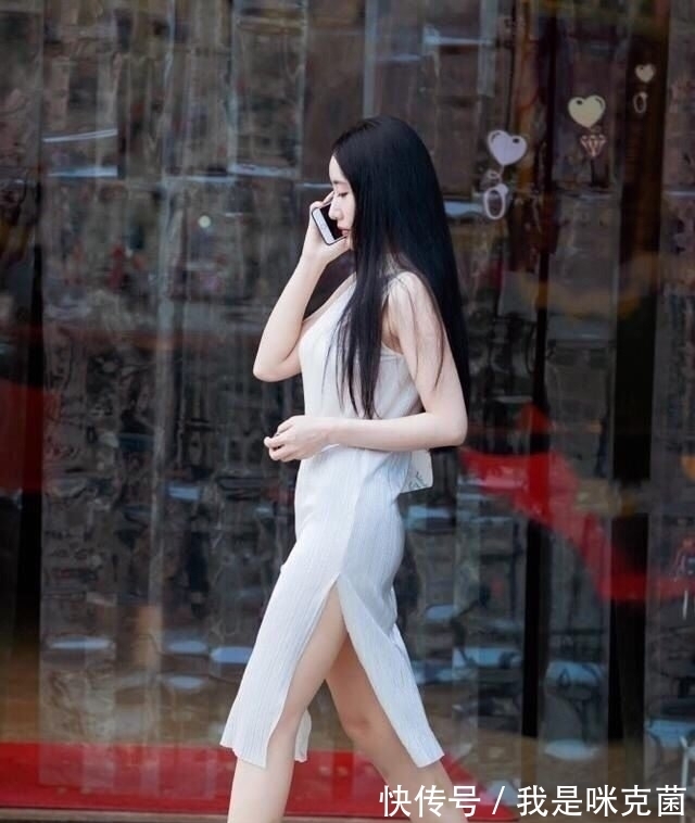 美腿|街拍:长发女人味儿十足,这样的大美腿简直让人无法抗拒!