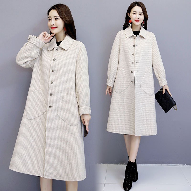 大气 建议大家大衣不要配黑裤子!瞧她那样穿,美得让人猜不出年龄