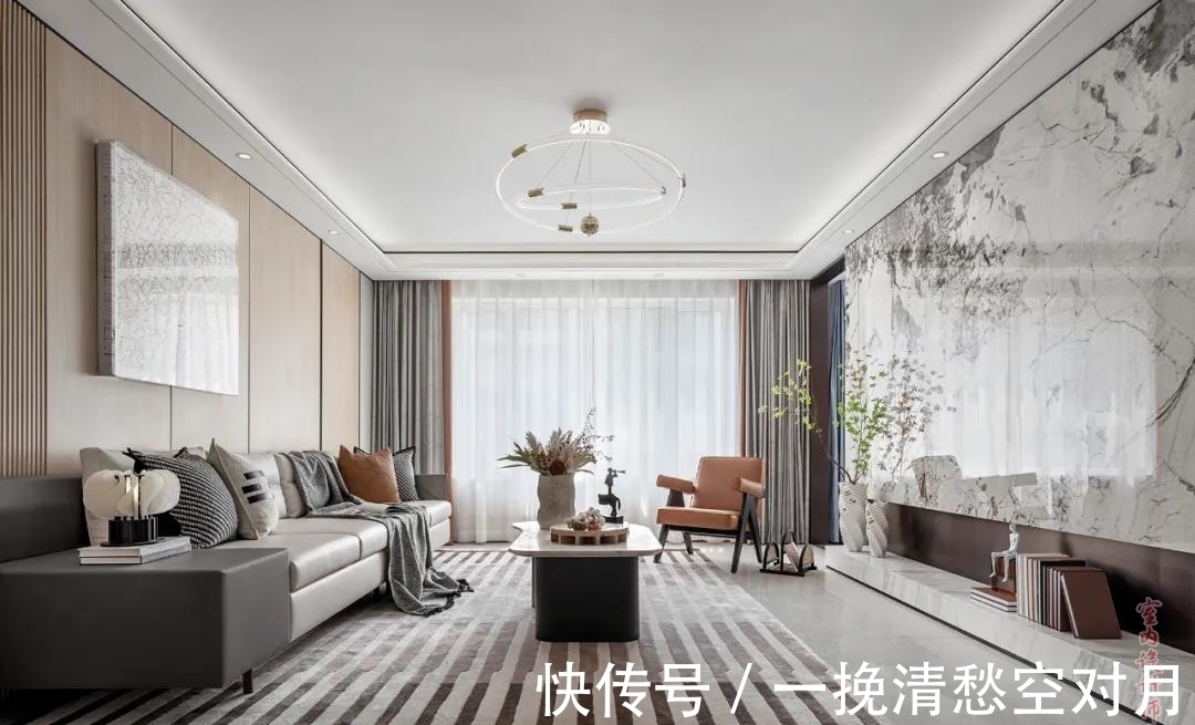 外面的世界|125㎡的三口之家,大理石电视背景墙和木饰面营造了诗意恬静的氛围
