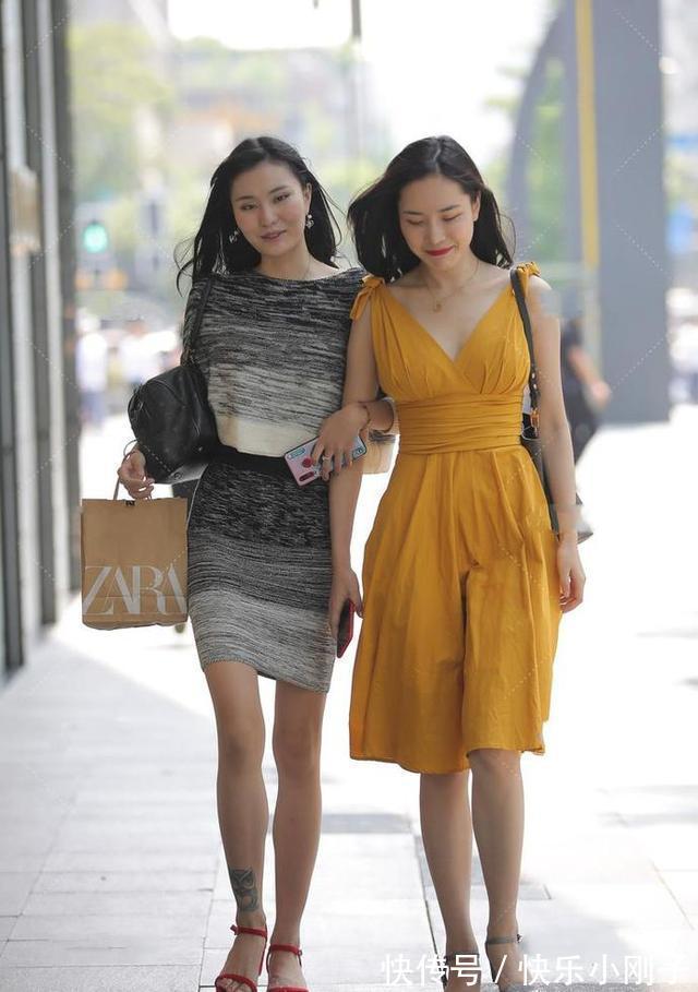 时尚 小姐姐身穿明黄色A字连衣裙搭配精美高跟鞋,看上去时尚又可爱