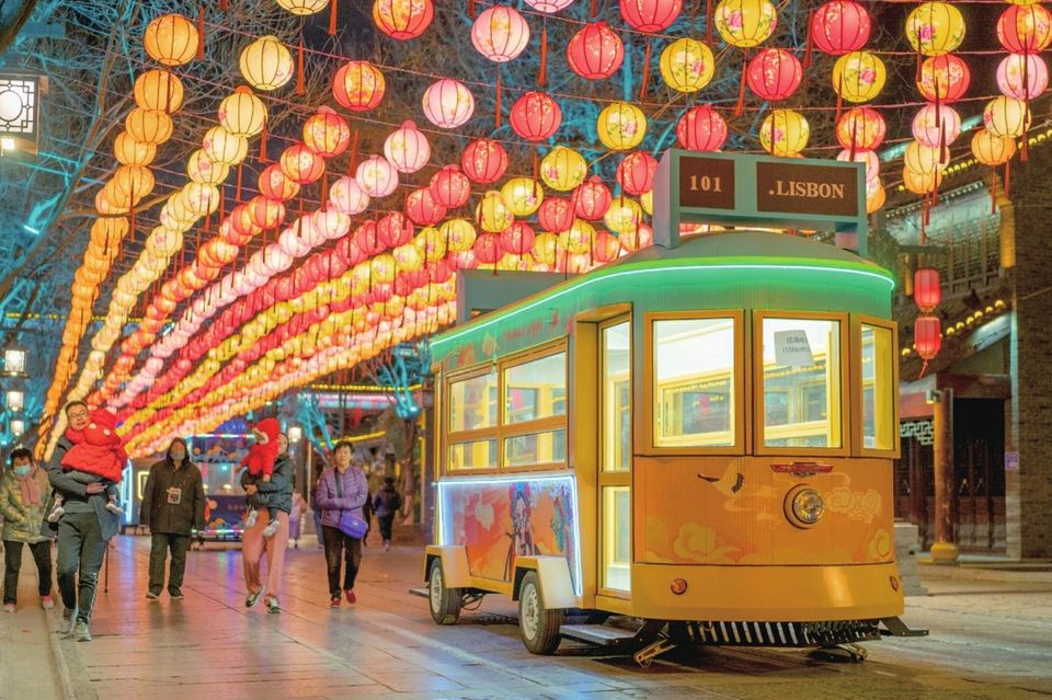 “冠军”快递员回乡记