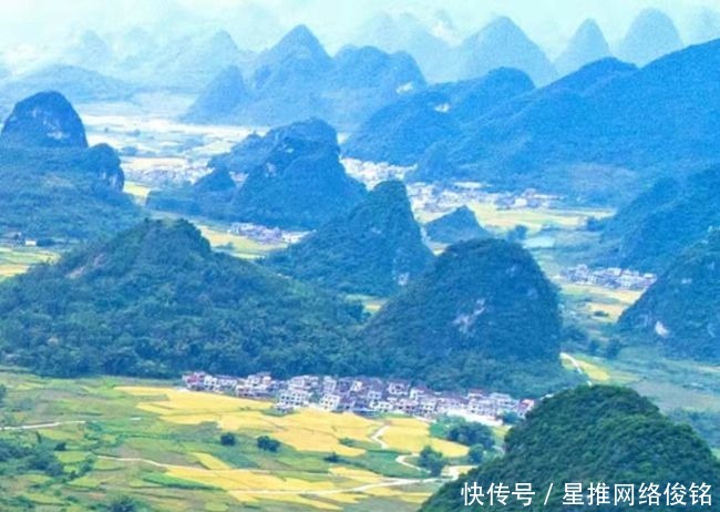 当绝美峰丛遇上金黄油菜花，忻城美得不像话！土司古城·浪漫忻城