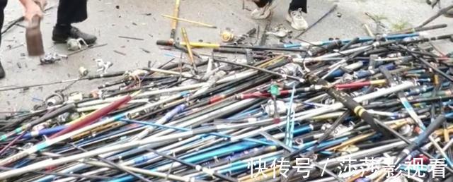湖北十堰集中销毁违规鱼竿400多支,用推土机压,厂家笑了?