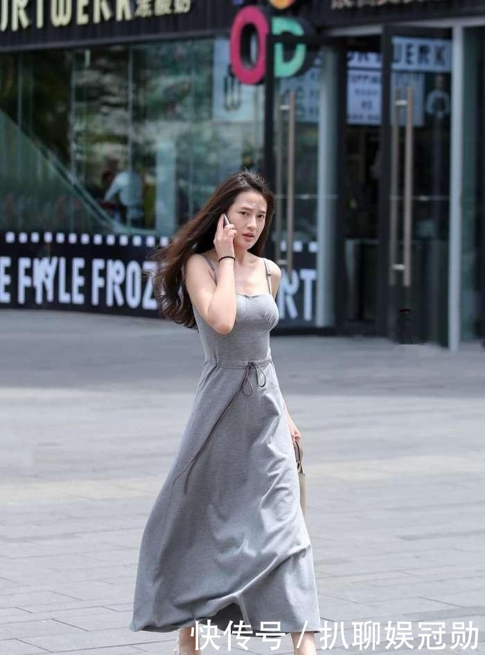 干练|少妇一袭长裙,眼神犀利,尽显干练利落