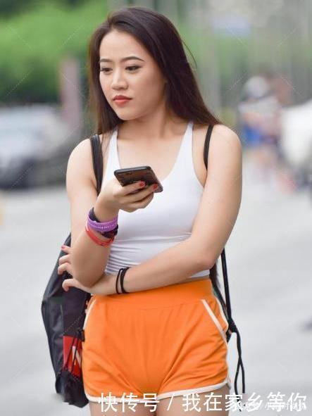 短裤|白吊带橙色运动短裤,时尚大方,充满活力
