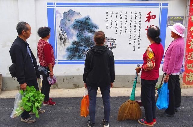 张建军!南华8名画家书法家手绘壁画 助力文明城市创建