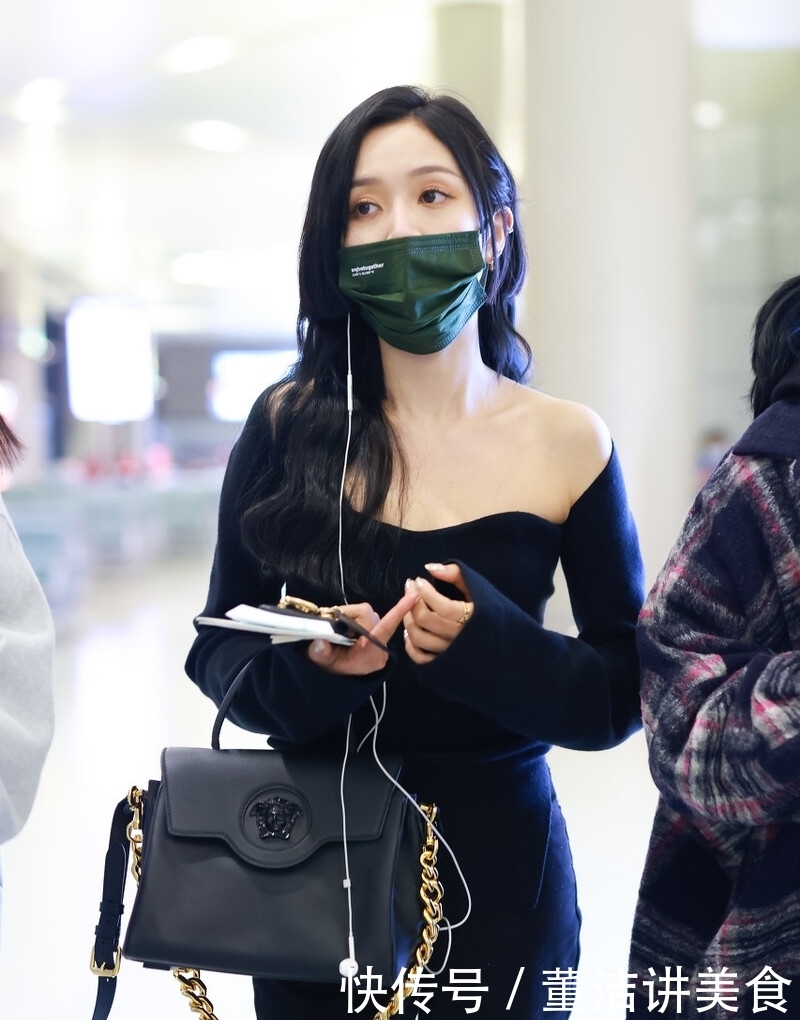 淡黄色的长裙,蓬松的头发,吴宣仪真是甜美又会穿,少女感满分