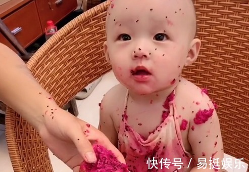火龙果|“佛系奶爸”带娃吃火龙果走红,娃内心毫无波澜 是爸爸弄得!