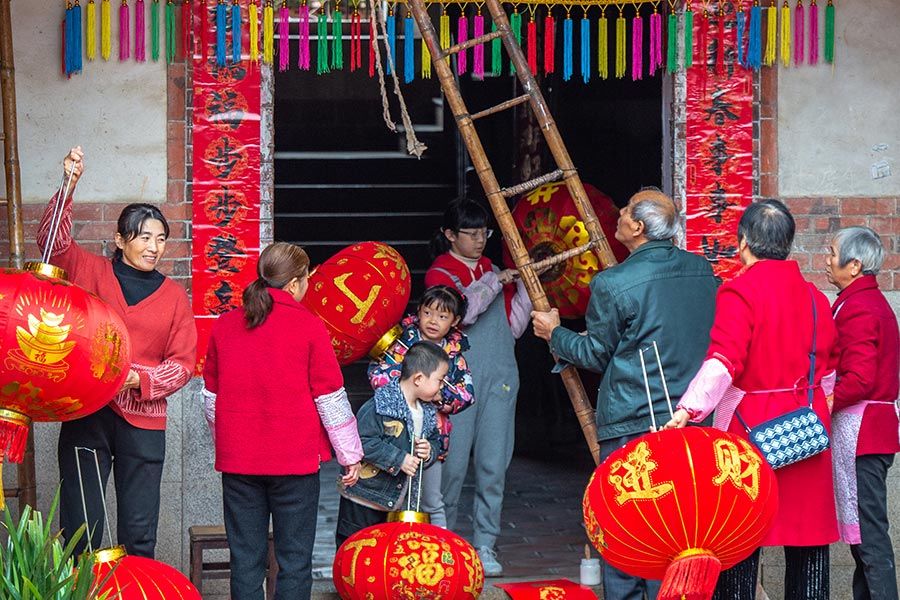 农贸市场|做乌米饭、挂红灯笼、写“福”送福 福建“年味儿”别样浓！