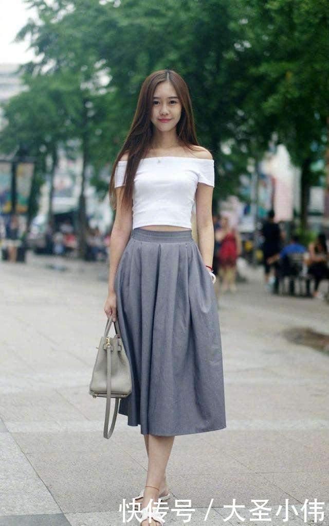 牛仔|美女街拍吊带小背心搭牛仔热库,时髦又个性,超有吸引力