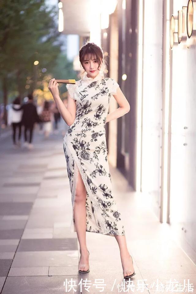 双腿|街拍:美女一身旗袍搭配高跟鞋,让双腿若隐若现更加性感,美的无可方物