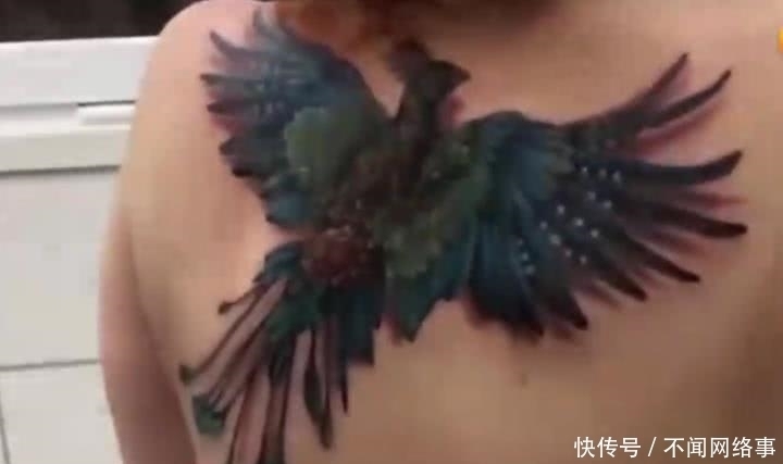 发生|女子在后背纹了一只凤凰,灯光交映下发生了神奇的一幕