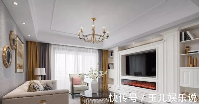 电视背景墙|153平轻奢浪漫美式四居,过道处设计了一排柜子,美观实用又大气