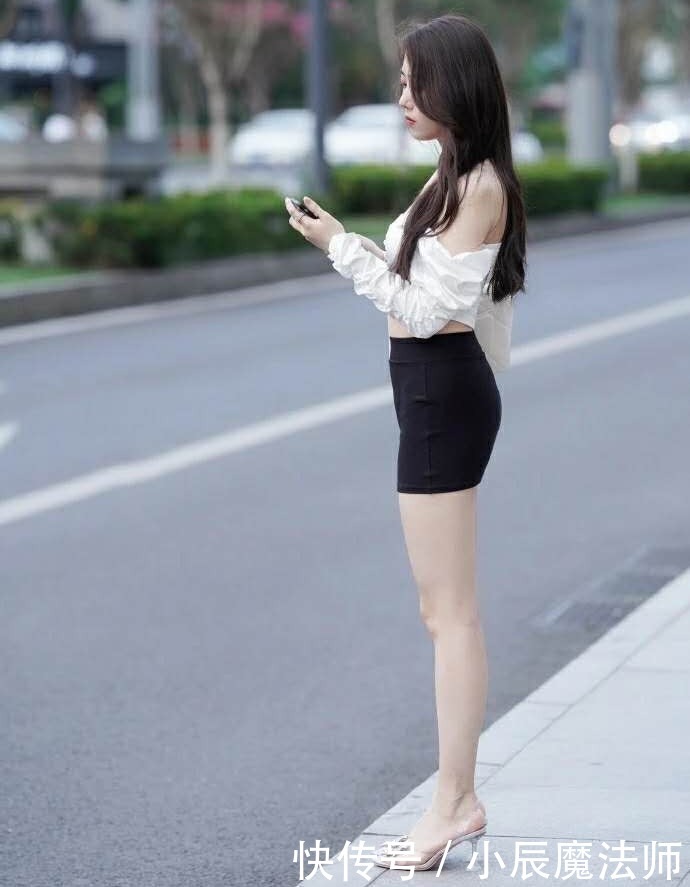 气质型美女，搭配黑色包臀裙，魅力强大