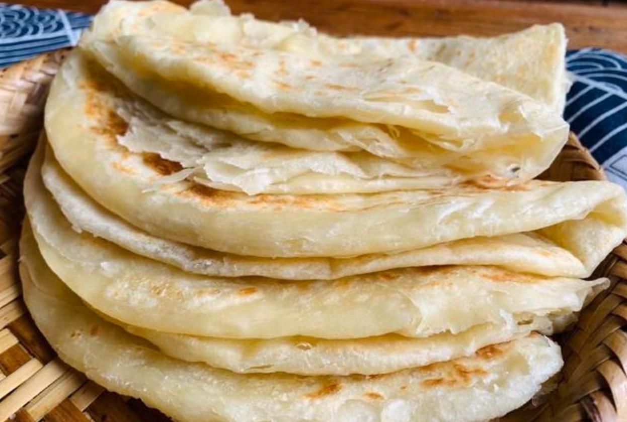 为啥你做的烙饼又干又硬?学会这招,烙好的饼层次分明、薄如纸