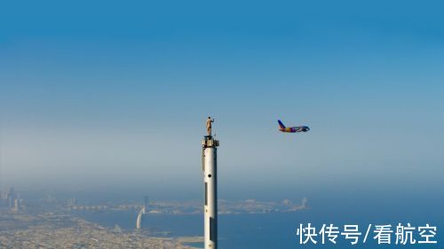 哈利法塔|阿联酋航空宣传迪拜世博会出奇招：哈利法塔高空广告难度升级