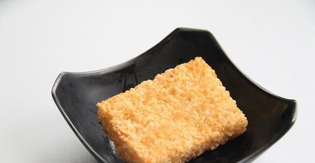 金黄|米饭被压榨和油炸金黄的年糕在口中留香